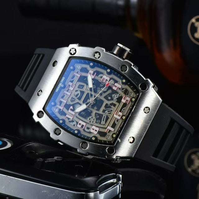 Richard Mille white carbon fiber sports watch—skeletonized dial and blue rubber strap