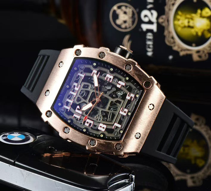 Richard Mille white carbon fiber sports watch—skeletonized dial and blue rubber strap