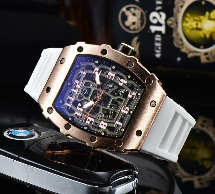 Richard Mille white carbon fiber sports watch—skeletonized dial and blue rubber strap
