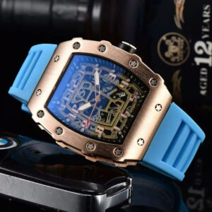 Richard Mille white carbon fiber sports watch—skeletonized dial and blue rubber strap