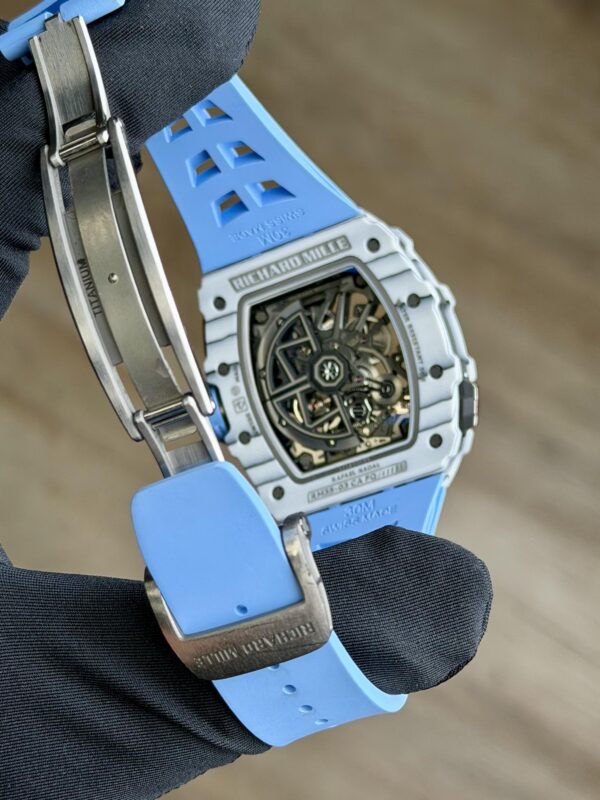 Richard Mille white carbon fiber sports watch—skeletonized dial and blue rubber strap